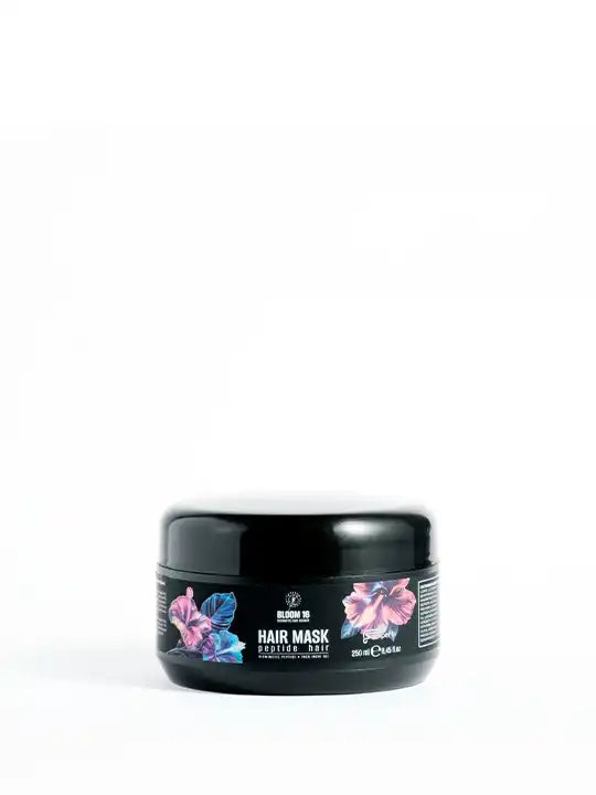 Bloom 16 Възстановяваща грижа за коса - Hair Mask 250ml in black container with floral design.